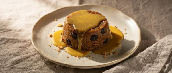 Gedämpfter Karottenpudding mit Buttersauce
