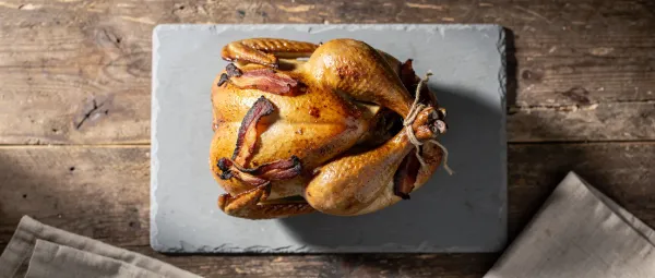 Hähnchen vom Ofen mit Speck