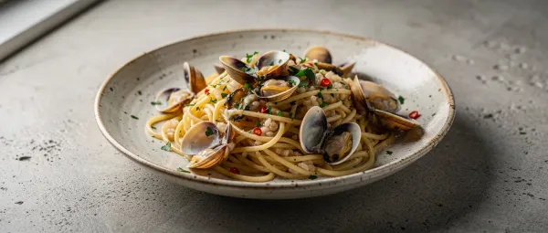 Spaghetti Risotto-Art mit Venusmuscheln